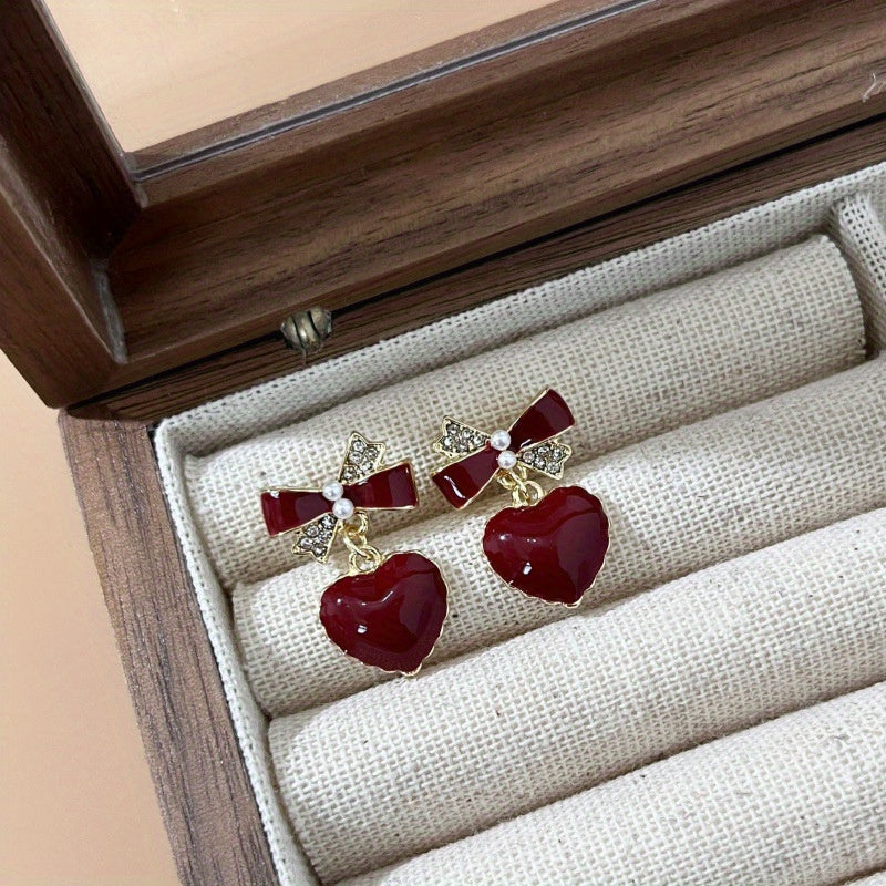 NALA | Elegantes pendientes en forma de corazón